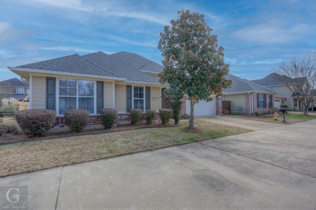 ranch-style home with a garage, driveway, a shingled roof, and a front yard