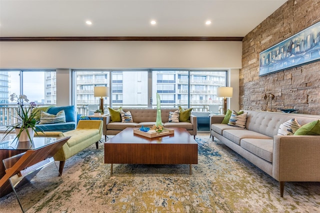 living room featuring ornamental molding and recessed lighting