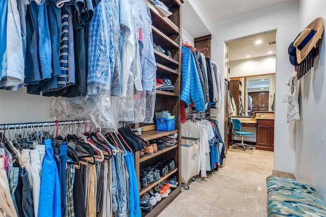 spacious closet featuring visible vents