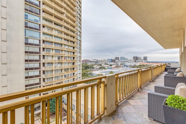 balcony featuring a view of city