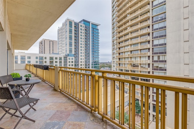 balcony featuring a city view