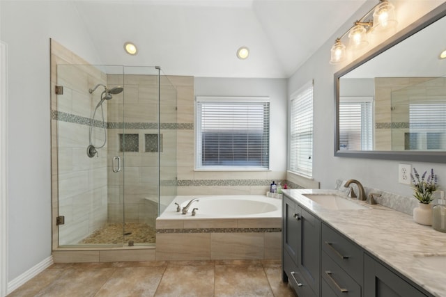 full bath with tile patterned flooring, vaulted ceiling, vanity, a shower stall, and a bath