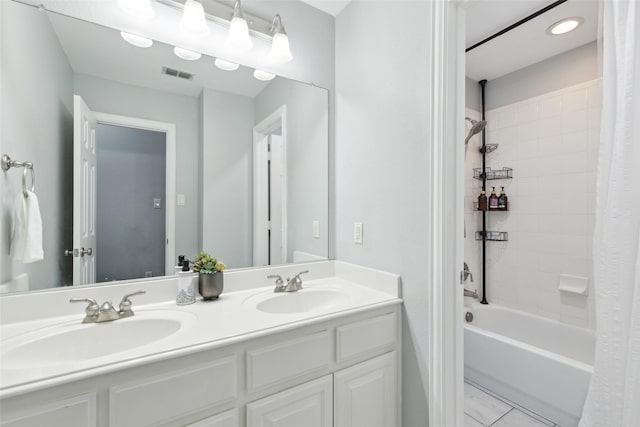 full bath with double vanity, shower / tub combo, a sink, and visible vents