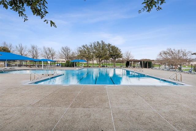 pool featuring a patio area