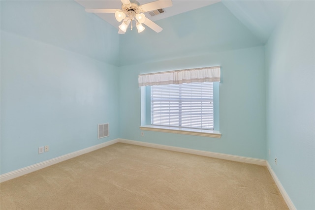 spare room featuring visible vents, ceiling fan, light carpet, and baseboards