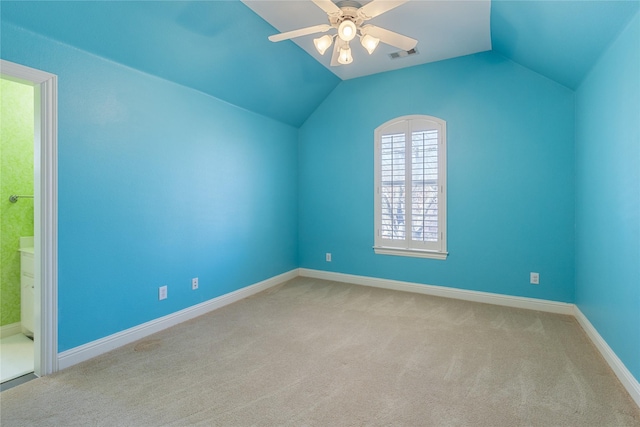 additional living space with baseboards, visible vents, a ceiling fan, light colored carpet, and vaulted ceiling