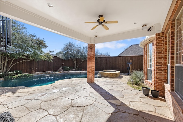 view of patio / terrace with a fenced backyard, a fenced in pool, and a ceiling fan