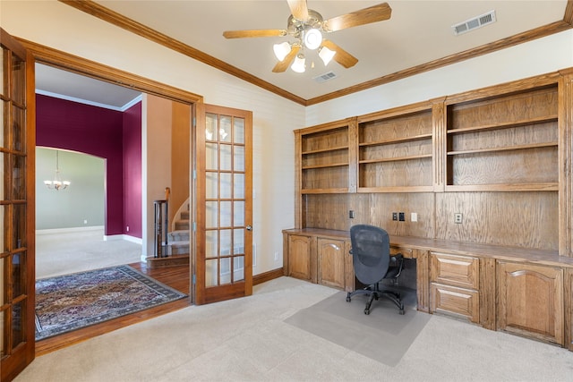 office space with ornamental molding, visible vents, light colored carpet, and french doors