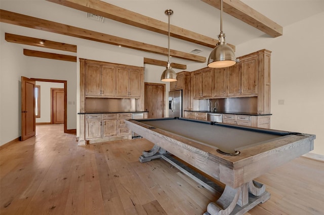 recreation room featuring billiards, baseboards, a sink, light wood-type flooring, and beam ceiling