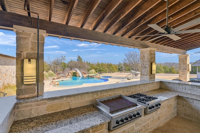 view of patio featuring ceiling fan, an outdoor kitchen, a grill, and a community pool