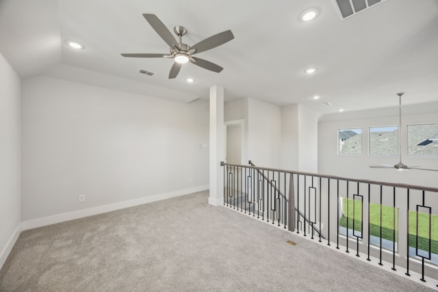 unfurnished room featuring recessed lighting, visible vents, and baseboards