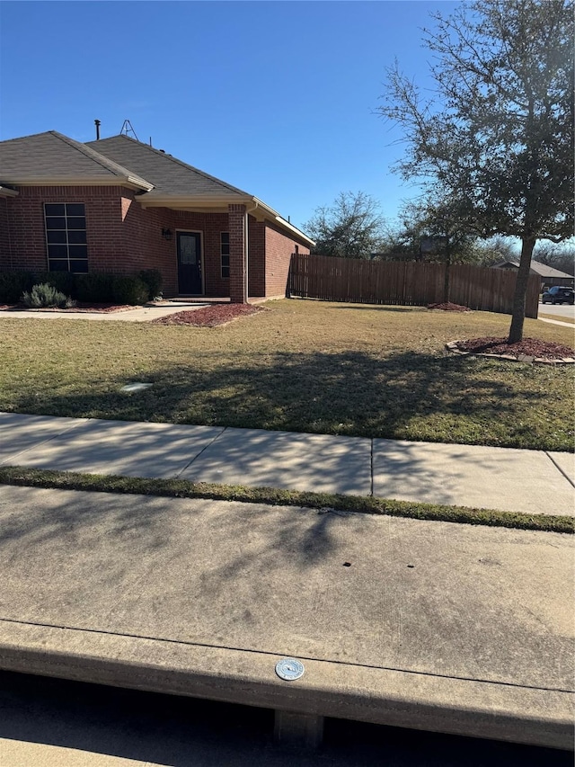 view of yard with fence