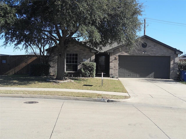 ranch-style house featuring brick siding, concrete driveway, fence, a garage, and a front lawn