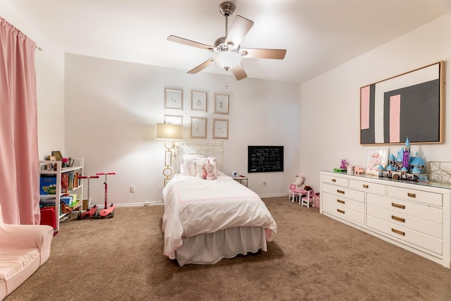 carpeted bedroom featuring a ceiling fan and baseboards