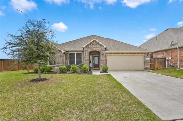 single story home featuring a garage, brick siding, fence, and a front lawn