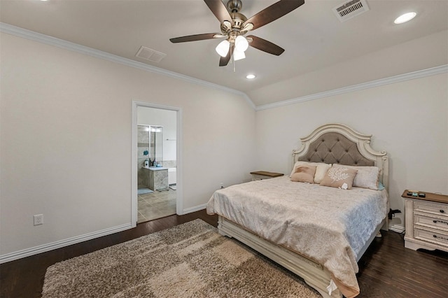 bedroom featuring dark wood-type flooring, visible vents, and crown molding