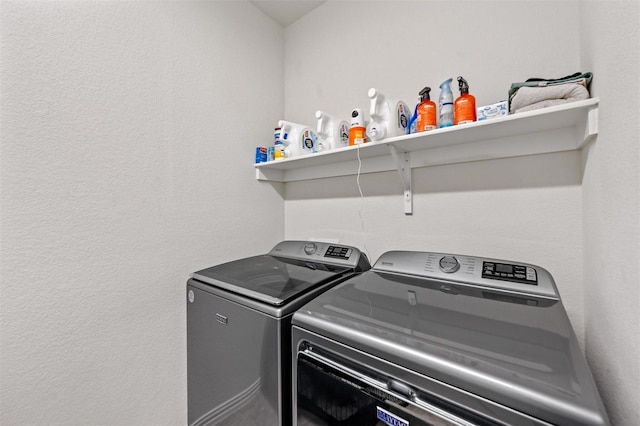 laundry area featuring laundry area and washing machine and clothes dryer