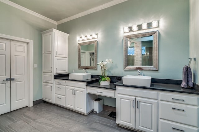 full bathroom featuring double vanity, a sink, and crown molding