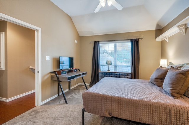 bedroom with a ceiling fan, lofted ceiling, carpet floors, and baseboards