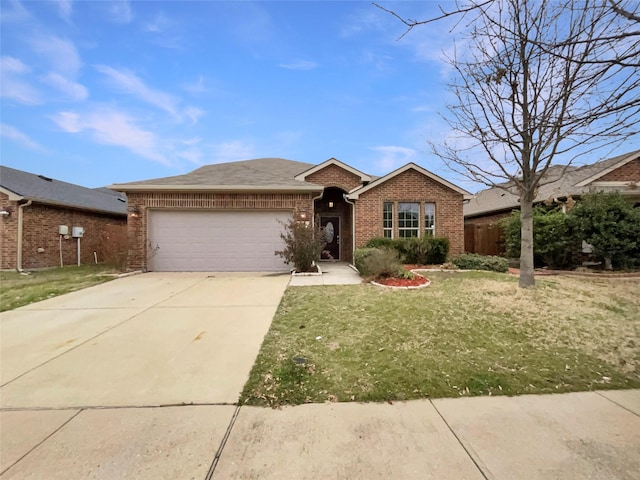 ranch-style home featuring a garage, driveway, brick siding, and a front lawn