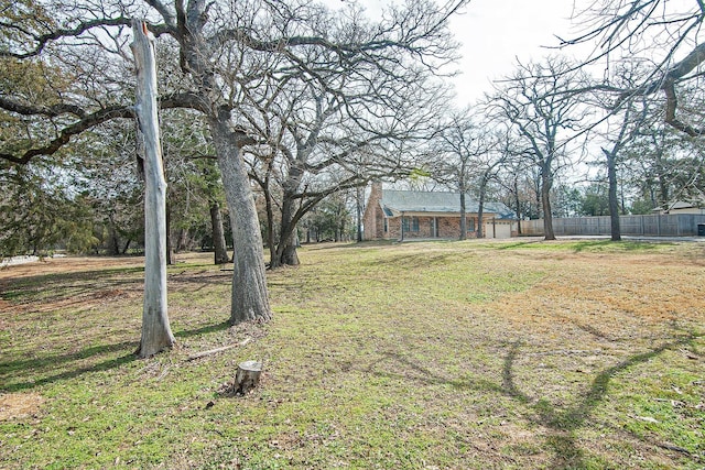 view of yard with fence