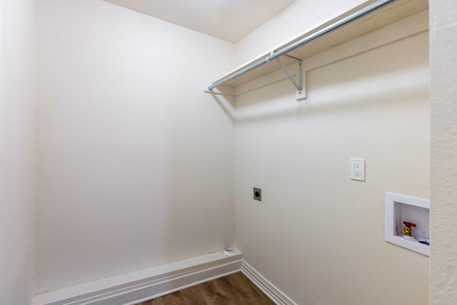 laundry area featuring laundry area, baseboards, dark wood-type flooring, washer hookup, and electric dryer hookup