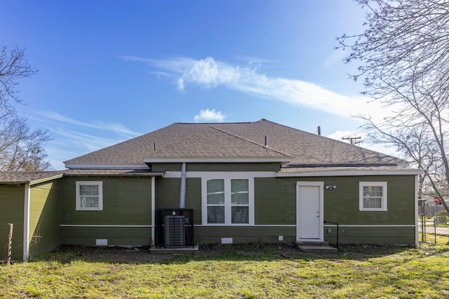 back of property featuring crawl space, a yard, cooling unit, and entry steps