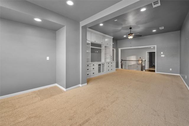 interior space featuring baseboards, a ceiling fan, visible vents, and recessed lighting