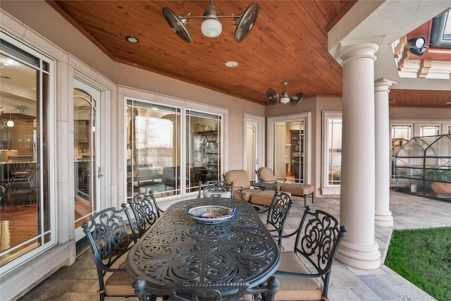 view of patio with ceiling fan and outdoor dining area