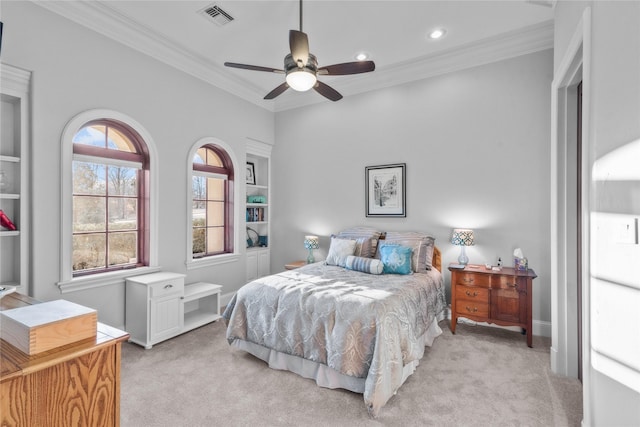 bedroom featuring light carpet, visible vents, and crown molding