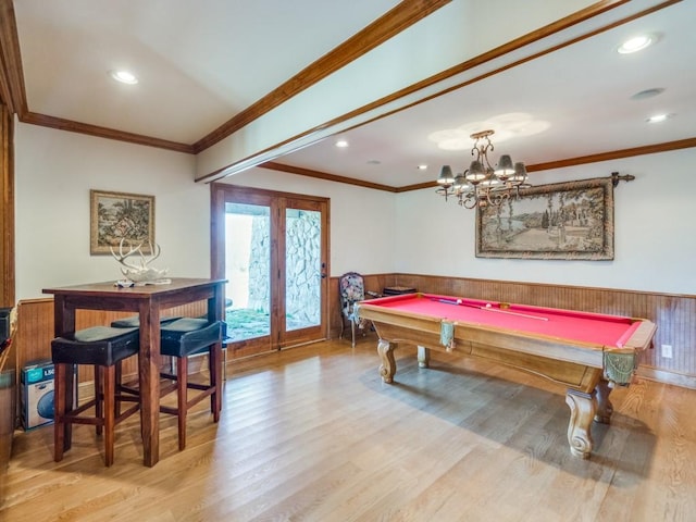 playroom featuring a wainscoted wall, wood finished floors, recessed lighting, pool table, and crown molding