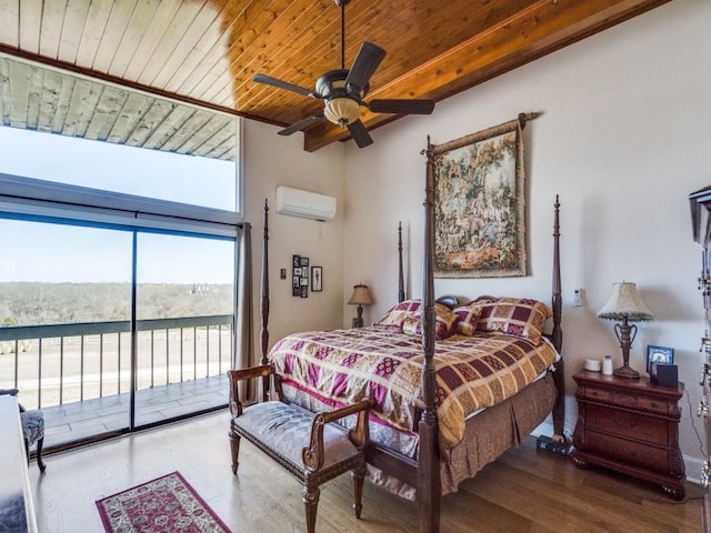 bedroom with beam ceiling, an AC wall unit, access to outside, wood finished floors, and wood ceiling