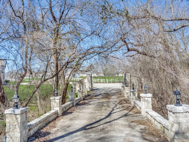 view of street featuring driveway