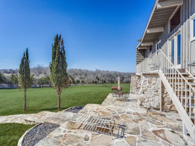 view of patio featuring stairway