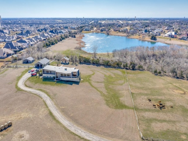 aerial view with a residential view and a water view