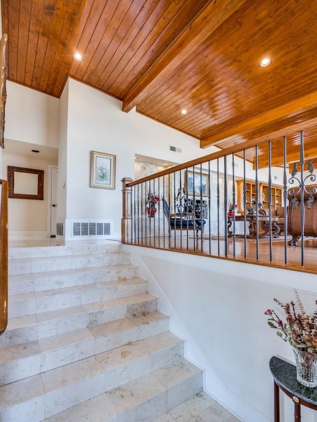 stairs with recessed lighting, visible vents, and wood ceiling