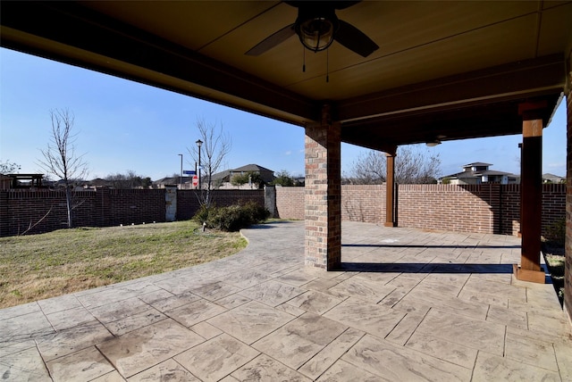 view of patio / terrace featuring ceiling fan and a fenced backyard