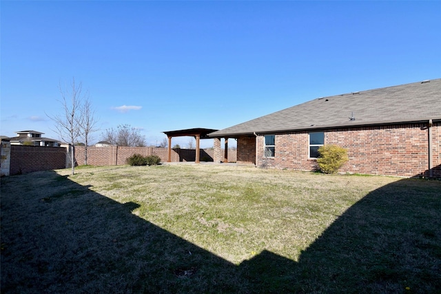 view of yard featuring a fenced backyard