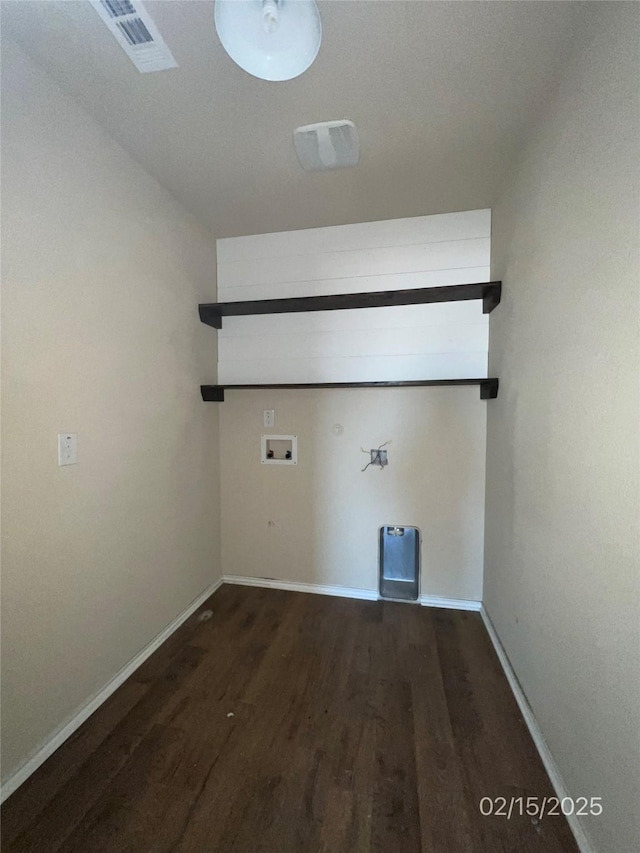 washroom featuring dark wood-style floors, laundry area, hookup for a washing machine, and baseboards