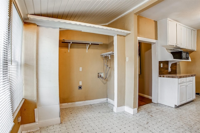 laundry area with wooden ceiling, washer hookup, baseboards, light floors, and electric dryer hookup