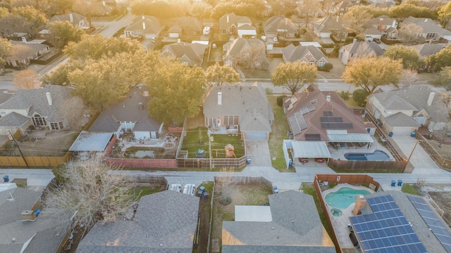 birds eye view of property with a residential view