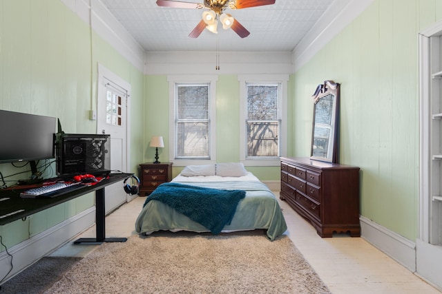 bedroom featuring ceiling fan and wood finished floors