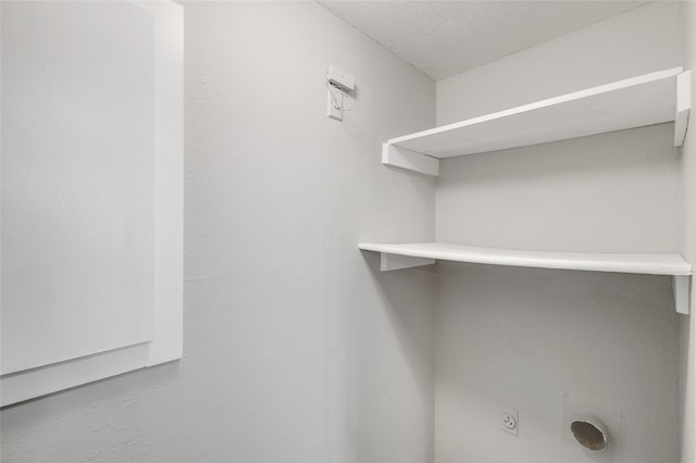 laundry room featuring laundry area and electric dryer hookup