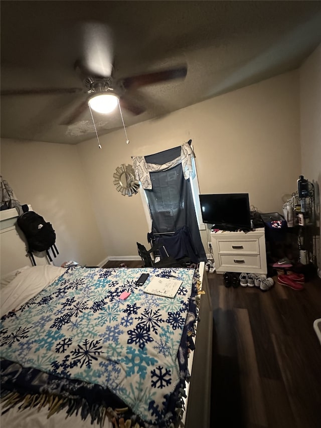 5813 Hiett Ct, Fort Worth, TX 76112 - bedroom featuring ceiling fan and wood finished floors