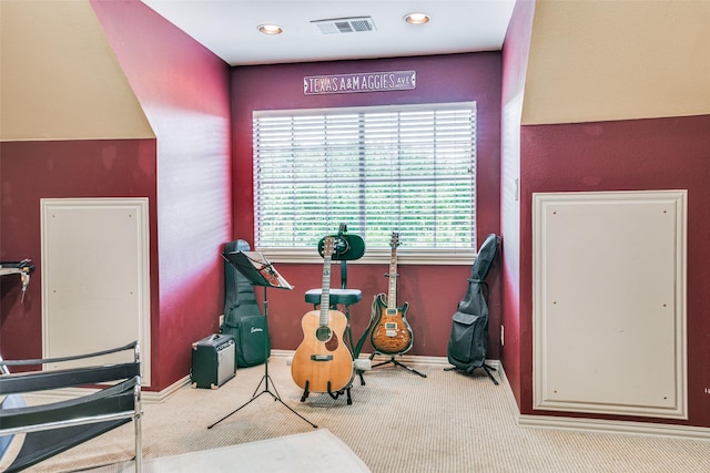 misc room with carpet, visible vents, and baseboards