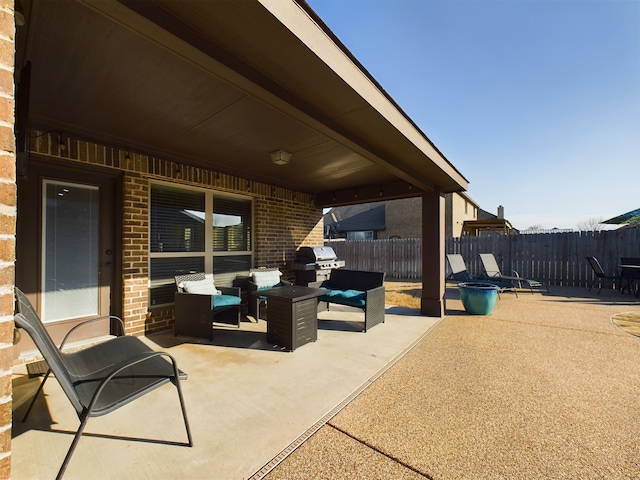 view of patio / terrace featuring fence and an outdoor living space