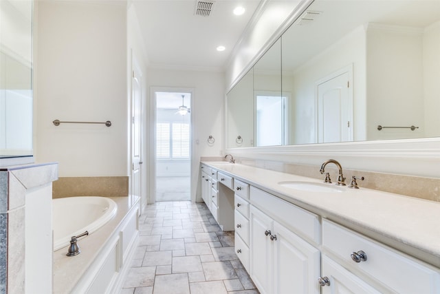 bathroom with crown molding, visible vents, and a sink