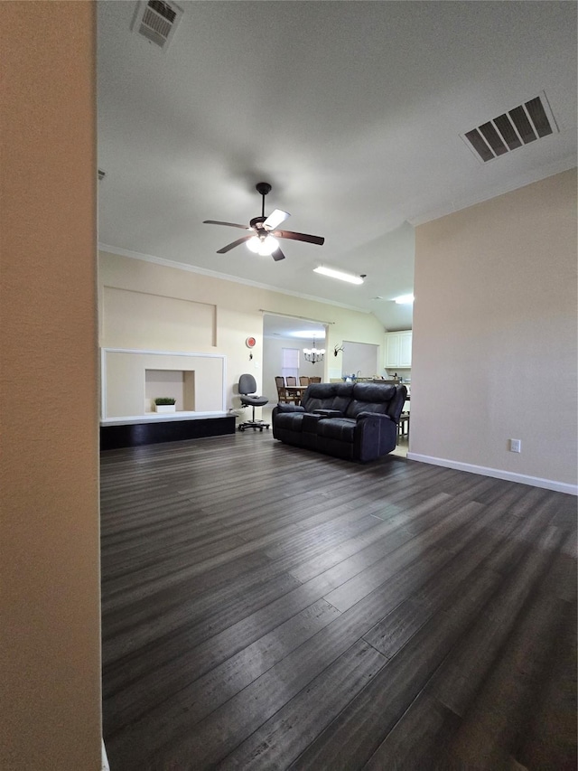 living area with dark wood-style floors, a ceiling fan, visible vents, and baseboards