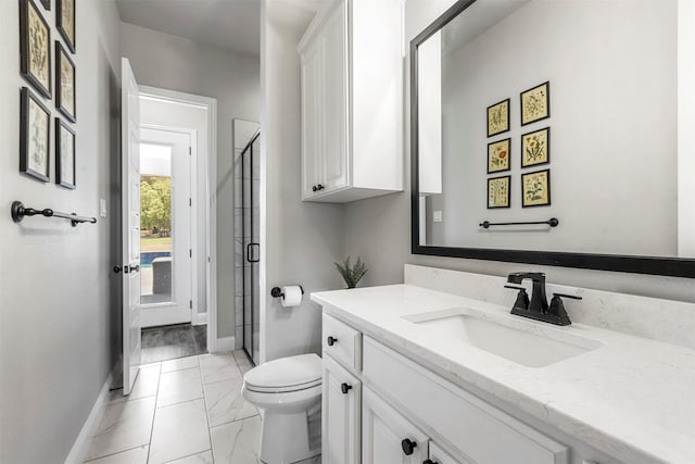 bathroom featuring baseboards, toilet, marble finish floor, vanity, and a shower stall