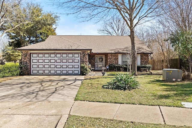 ranch-style house with brick siding, concrete driveway, an attached garage, fence, and a front lawn